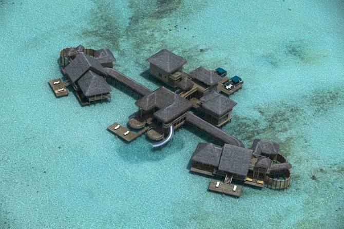 Незабываемые домики на Мальдивах (25 фото)